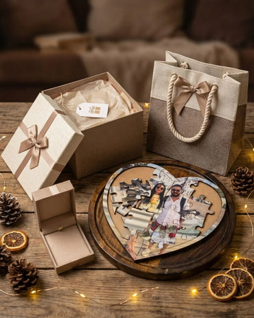 Wooden love puzzle heart with photo collage, surrounded by gift boxes and rope handles