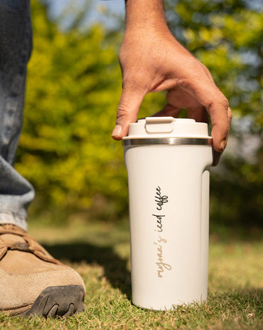 White smart thermal mug held in hand; lid on top, personalized script front