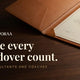 Leather portfolio holding a completion certificate with a raised embossed seal, headline Make every handover count