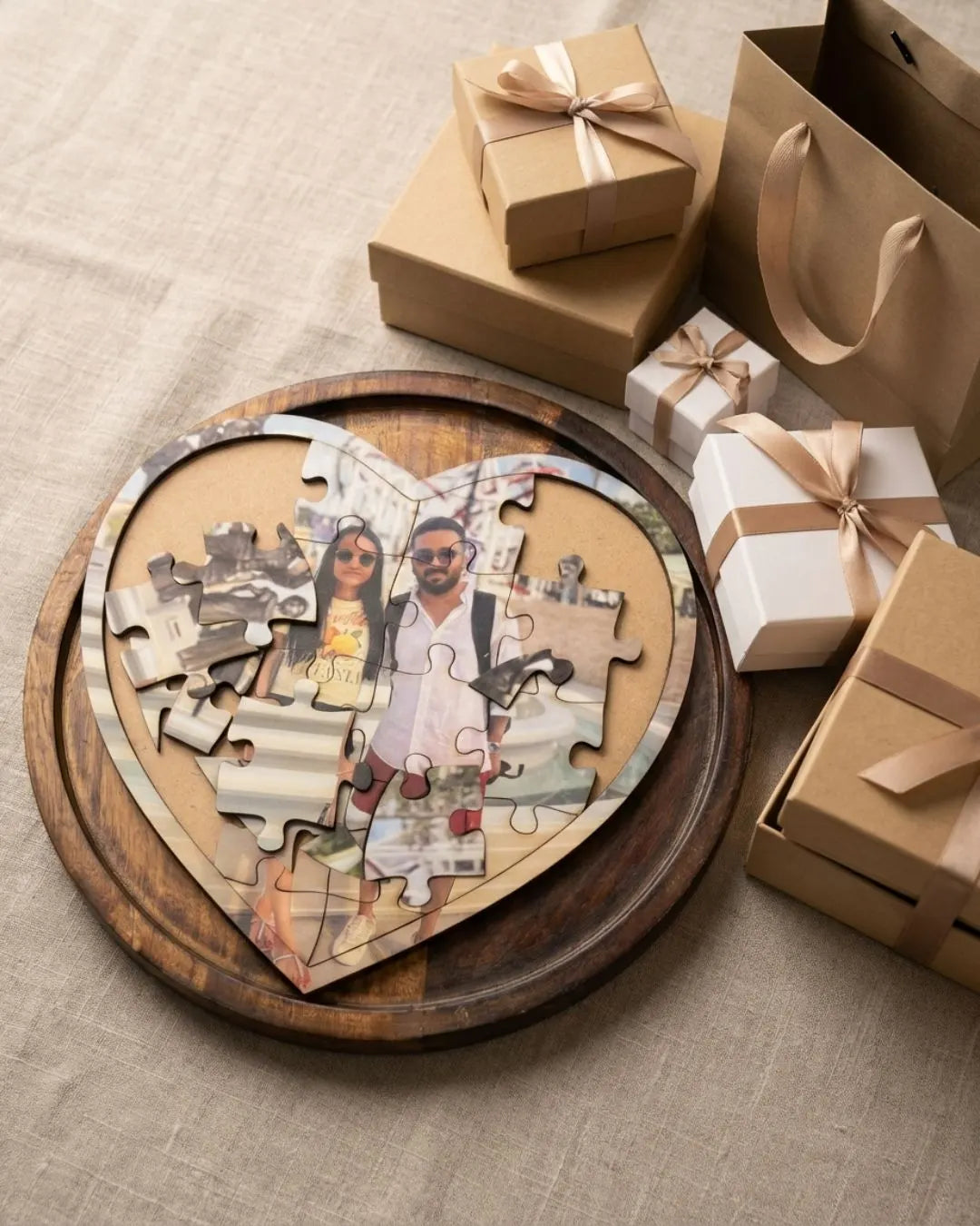 Heart-shaped personalized wooden love puzzle with photo jigsaw pieces in a circular frame