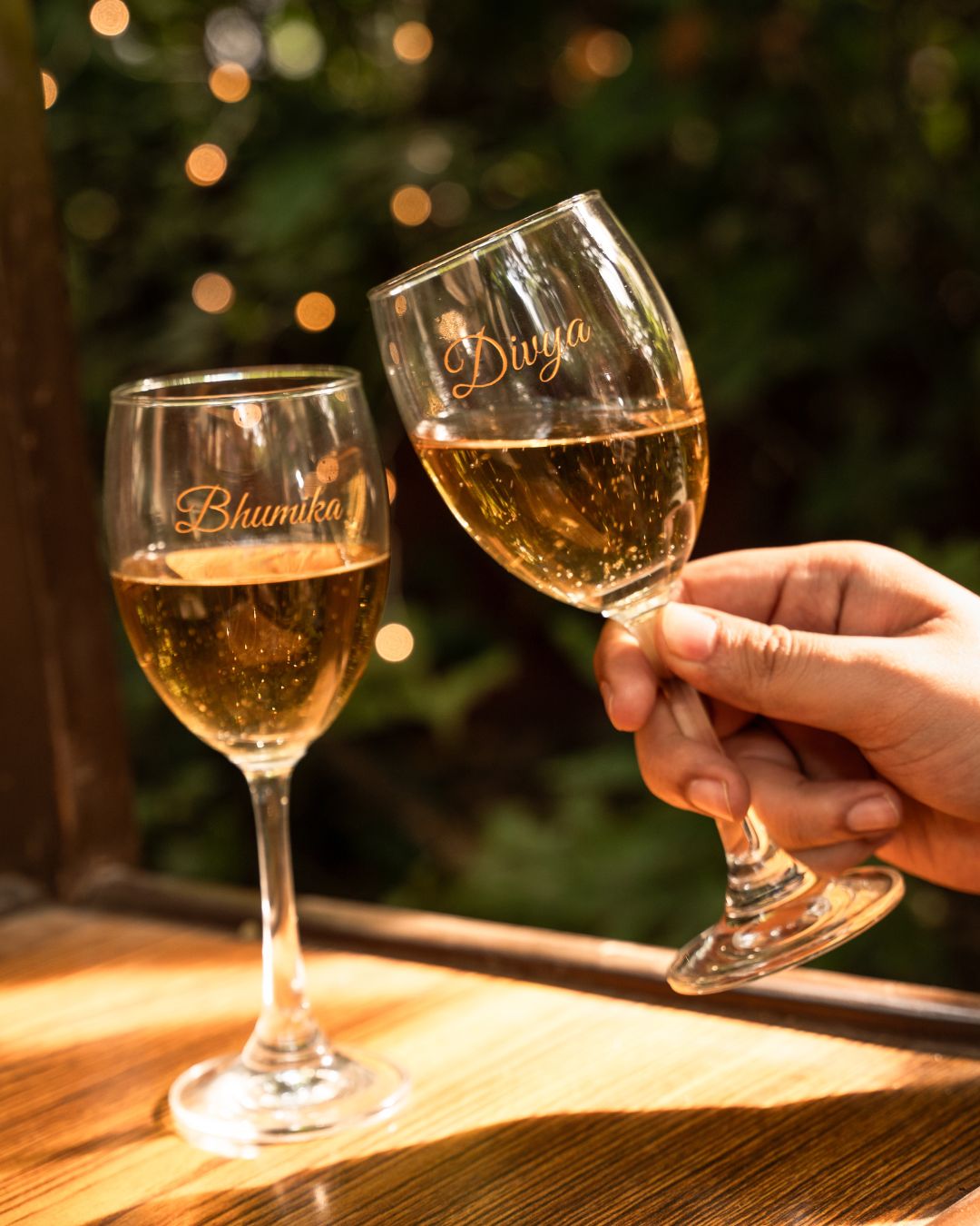 Set of 2 personalized wine glasses with gold 'Bhunika' and 'Diya' engravings