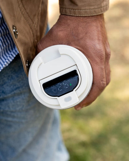 White smart thermal mug lid open, showing digital display window