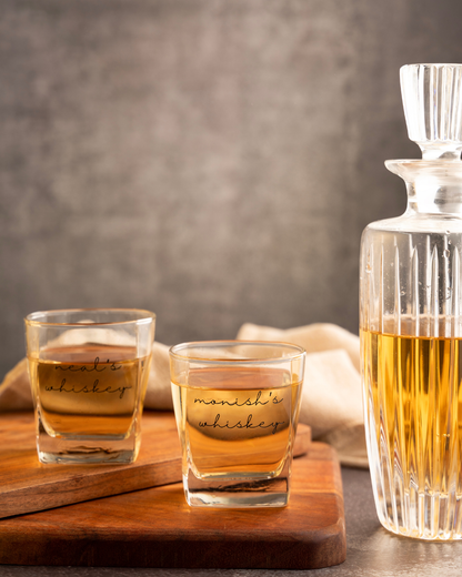 Lineage Pour bespoke heritage whiskey glass with amber liquid and etched script