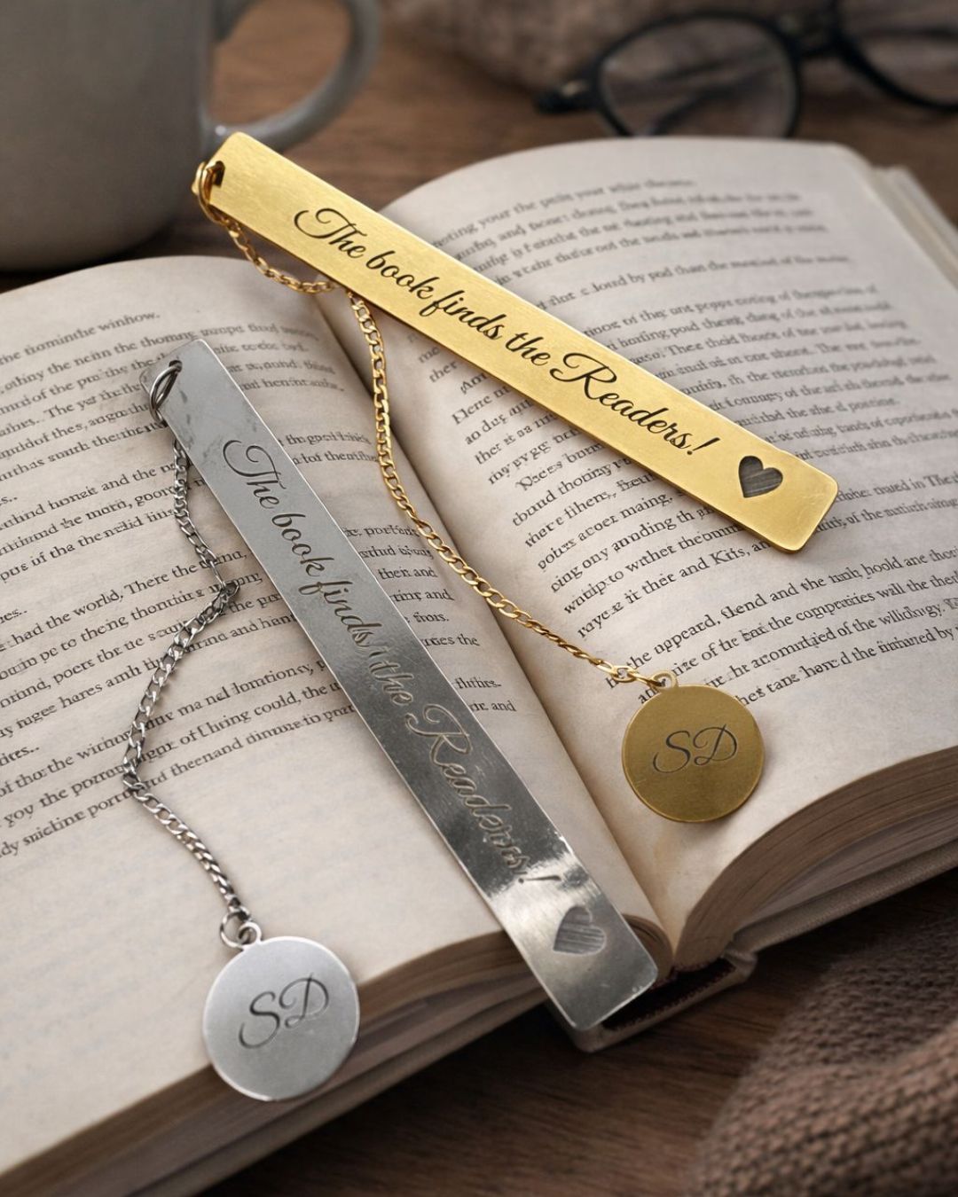 Gold and silver metal bookmarks with heart accents and round monogram tags