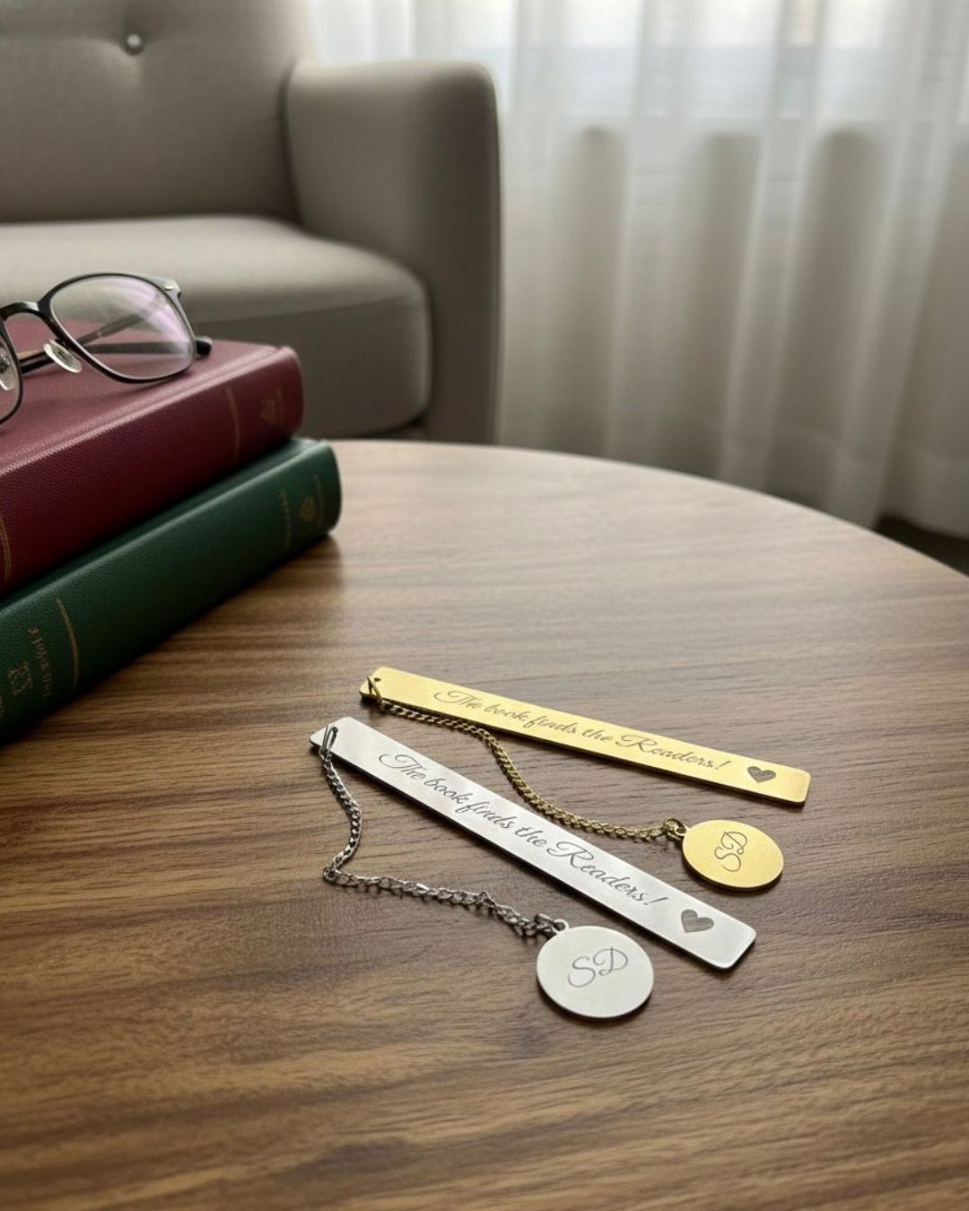 Gold and silver metal bookmarks with heart details and round monogram pendants