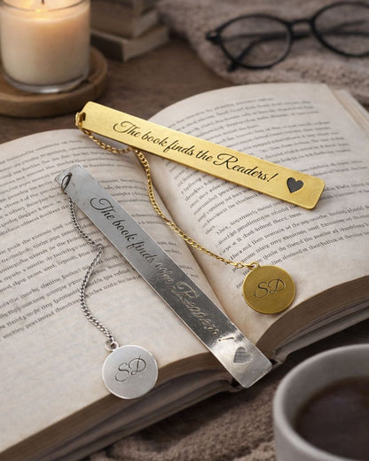 Gold and silver metal bookmarks with heart accents and round “SD” monogram charms