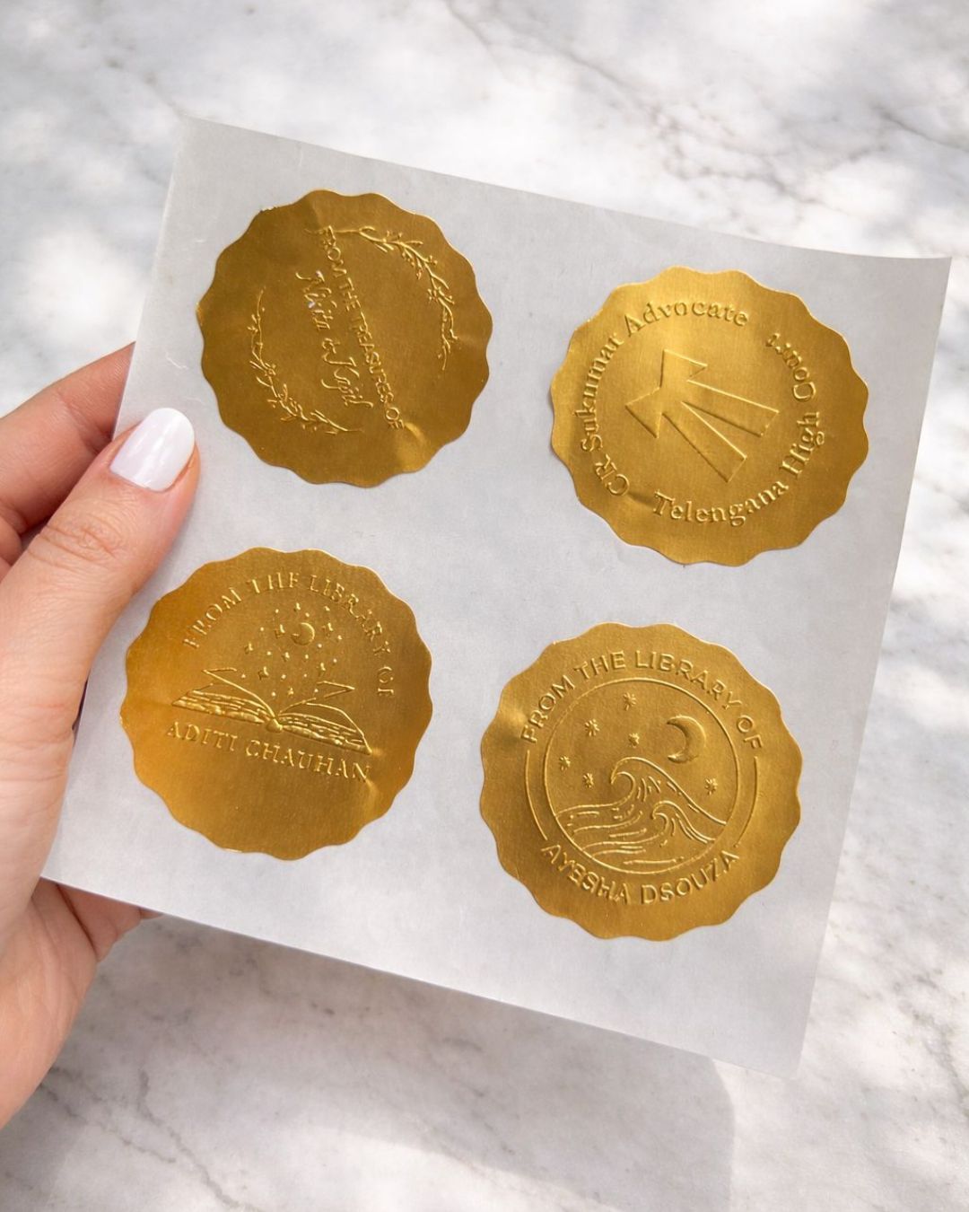 Gold embossed seal cards on white sheets, round designs, set of 20