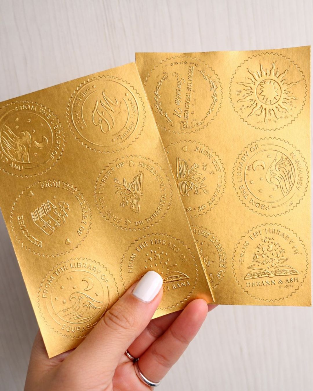 Gold embossed seal cards with ornate round emblems and scalloped edges, set of 20